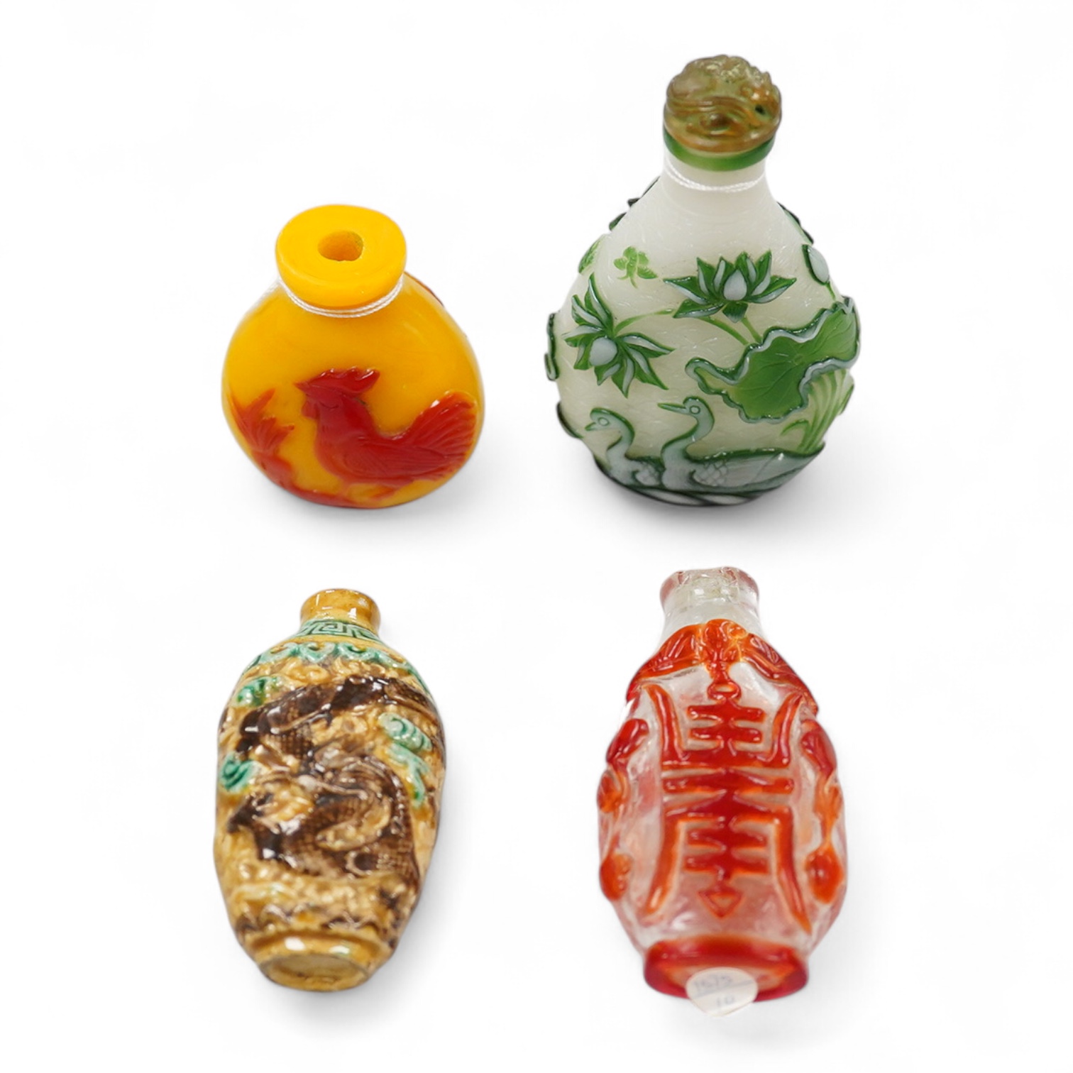 Three Chinese glass snuff bottles and a porcelain snuff bottle(4), tallest 8cm high